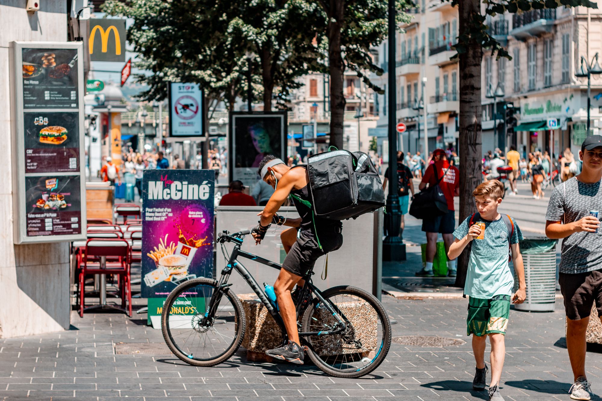  A delivery guy on his bicycle outside McDonalds in Nice: A photo by David Elikwu