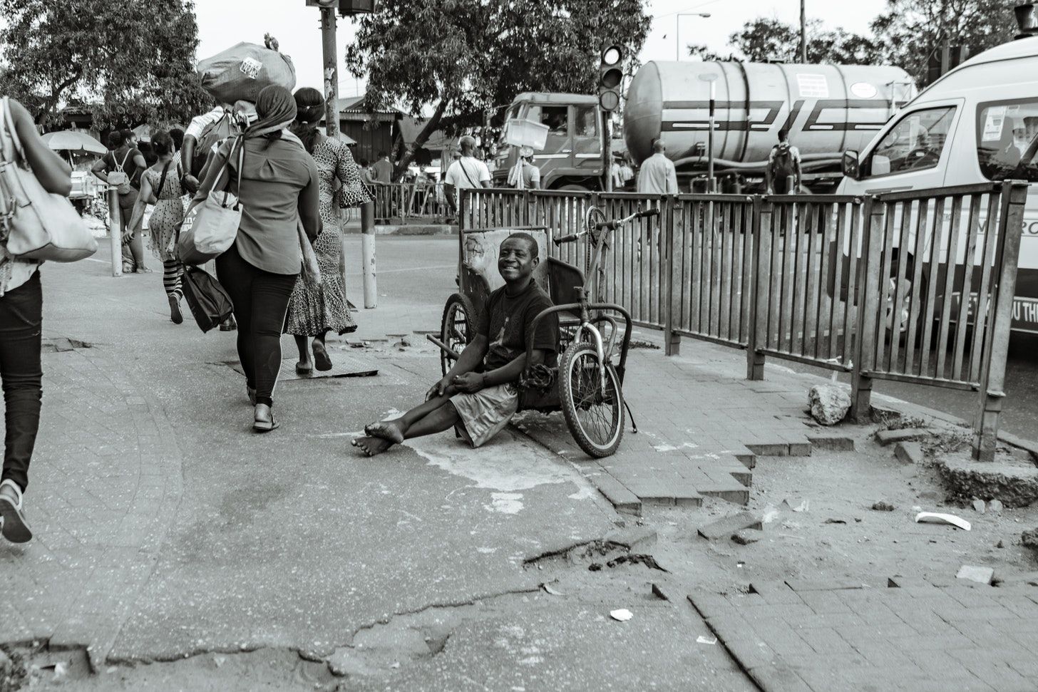 A handicapped man sitting on his bike in Accra: A photo: by David Elikwu