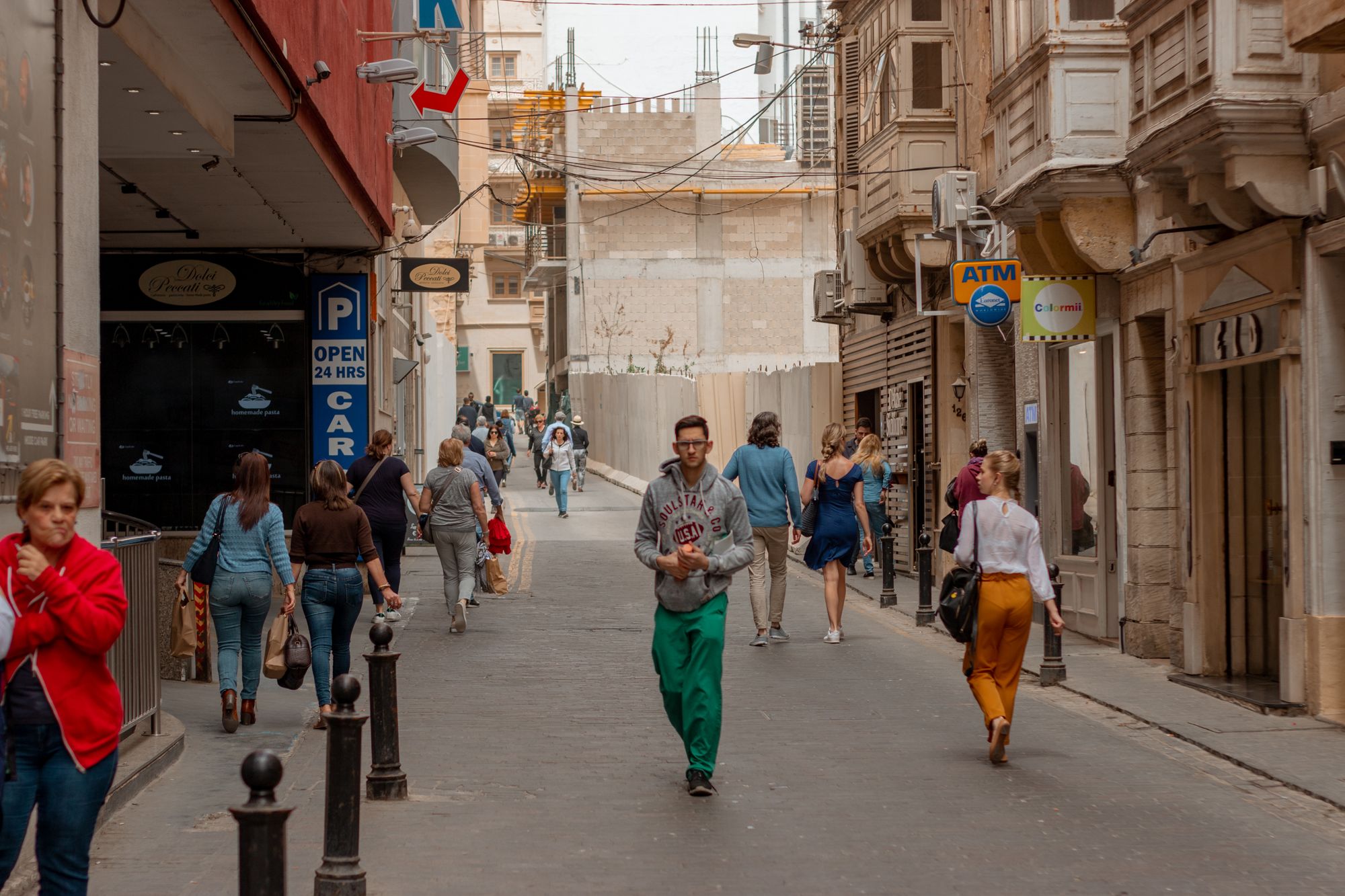 People walking in Malta: A photo by David Elikwu